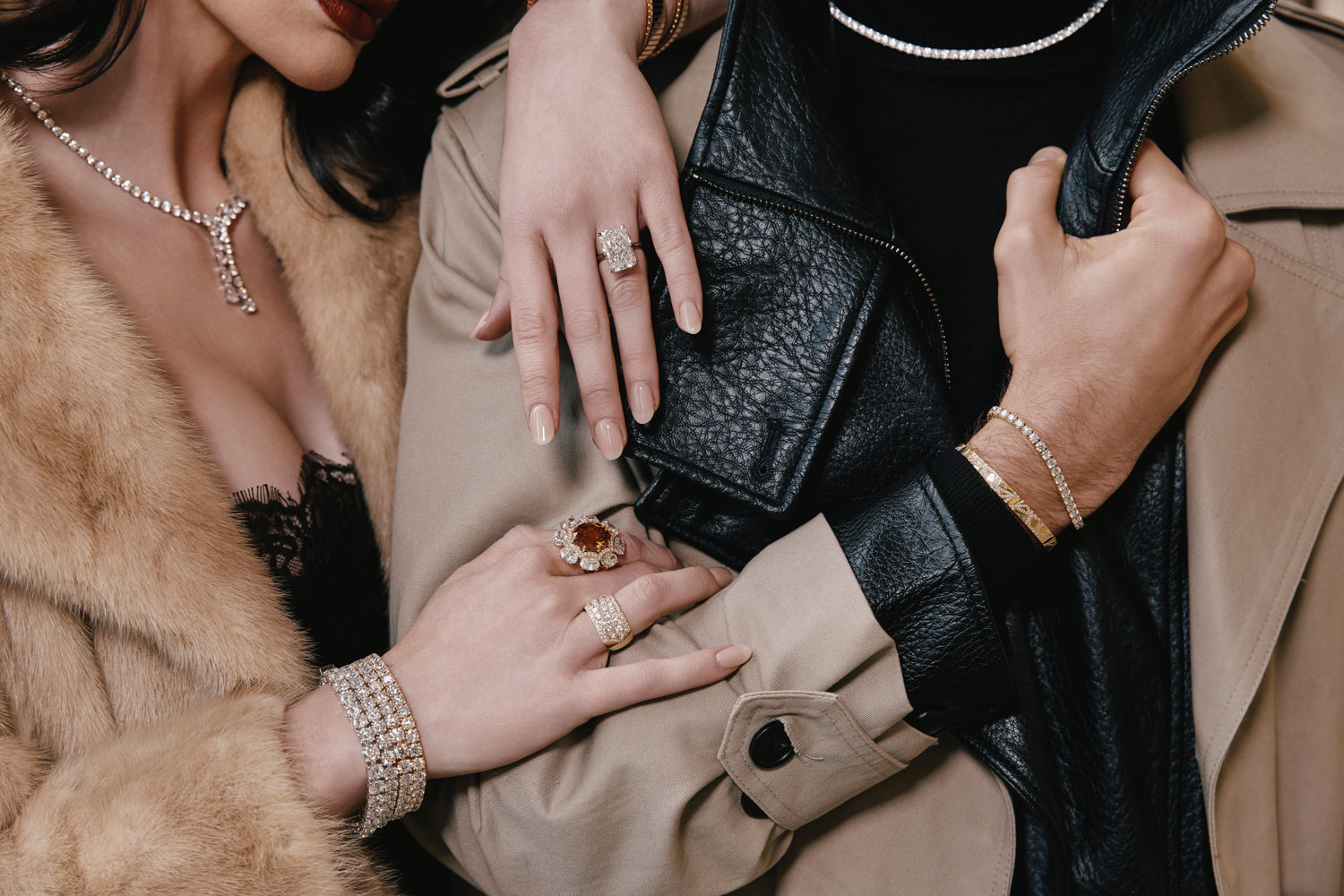 Most Wanted - man and woman wearing diamonds