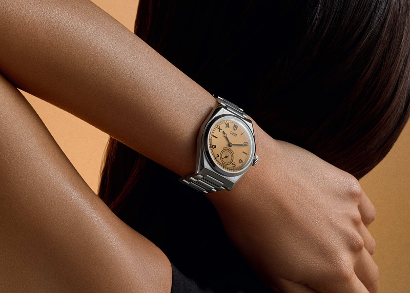 Woman wearing TUDOR Monarch watch